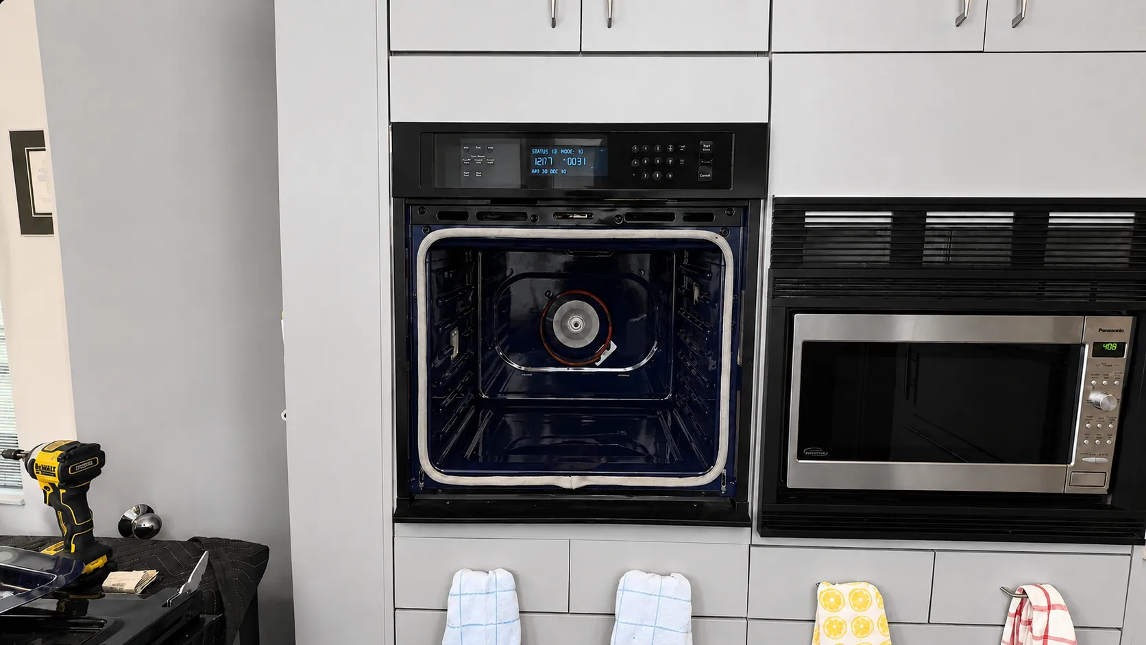 Built in wall oven set into modern kitchen cabinetry