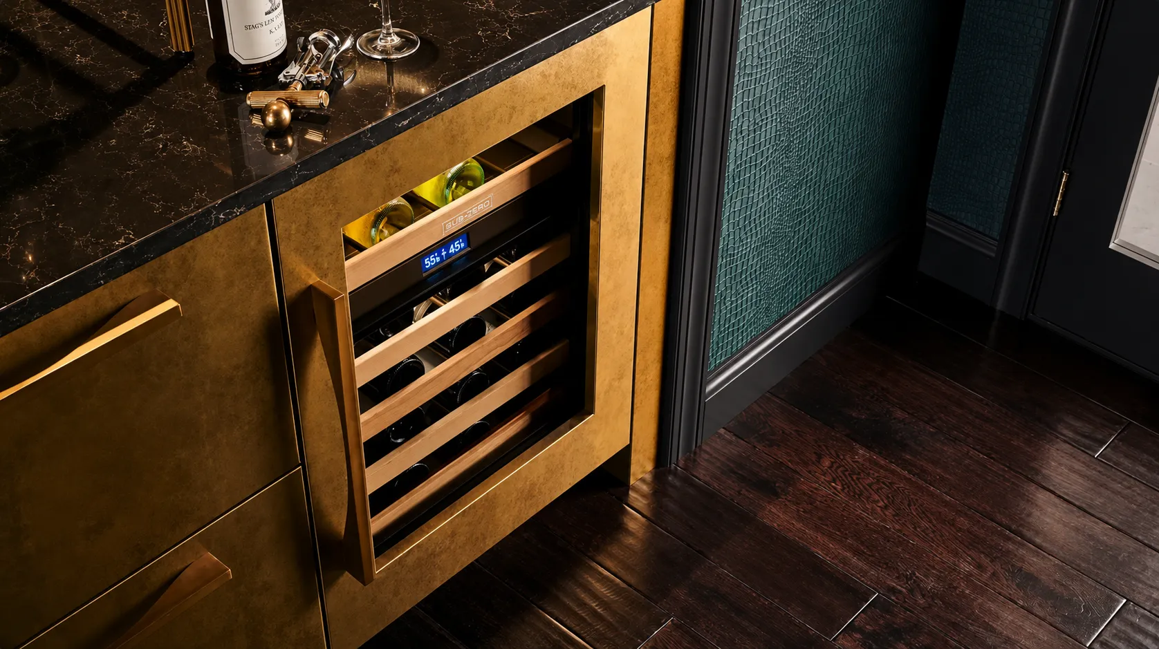 Built-in wine storage column in a gold-toned cabinet